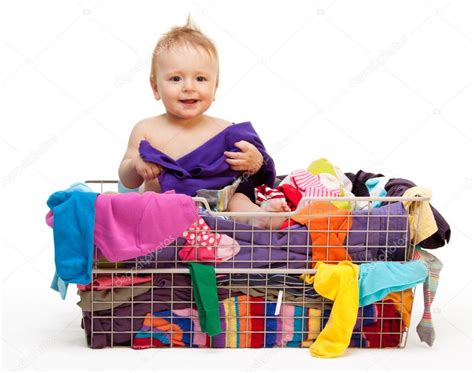 Happy baby with clothes Stock Photo by ©serrnovik 6288080