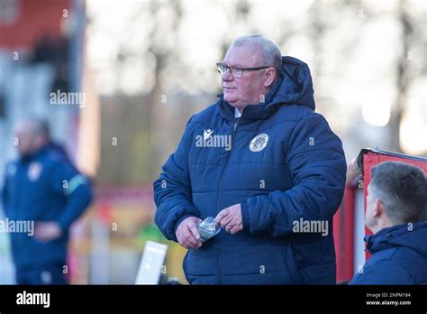 Football manager Steve Evans standing on touchline during game whilst ...