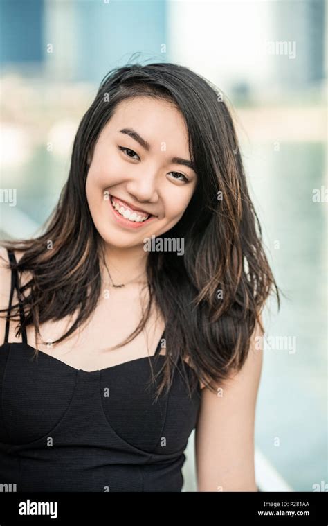 Portrait of a Beautiful Young Asian Girl Smiling, close up Stock Photo ...