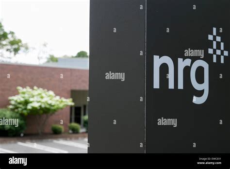 A logo sign outside of the headquarters of NRG Energy, Inc., in ...