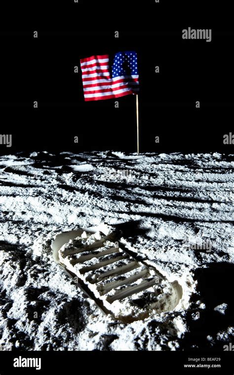 An American flag and footprint on the moon Stock Photo - Alamy