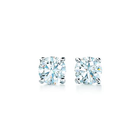 Tiffany solitaire diamond earrings in platinum. | Tiffany & Co.