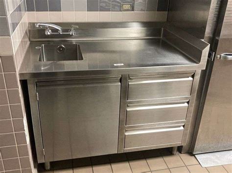 Stainless Steel table with sink - McLaughlin Auctioneers, LLC- mc-bid.com