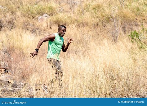 Young Black Man Running at Forest Trail Stock Photo - Image of ...