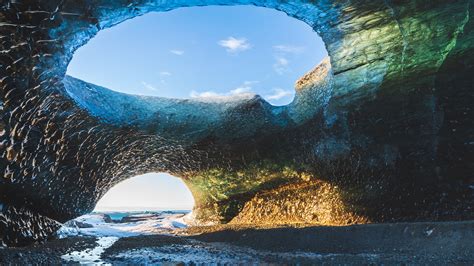 Sunrise over ice caves at the Breidamerkurjokull glacier, part of ...