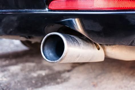 Smoky Exhaust Pipe — Stock Photo © ruigsantos #33465699