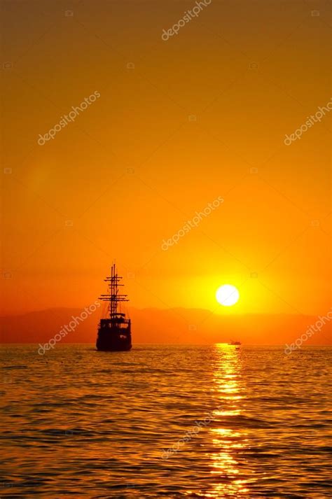 Pirate ship in sunset — Stock Photo © klax #12805151