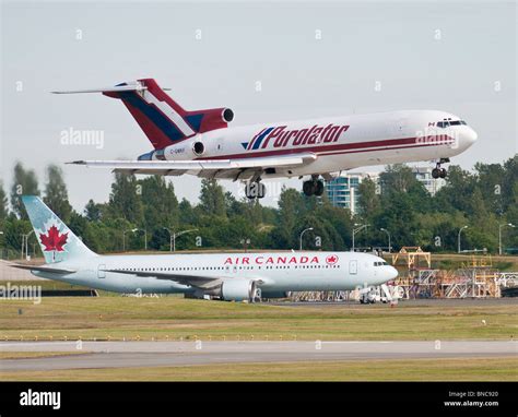 A Kelowna Flightcraft Air Charter Ltd Boeing 727 cargo jet in Purolator ...