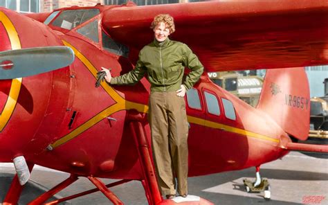 [Colorized] Amelia Earhart and her Lockheed Vega 5b. In honor of his 121 year birthday(july 24 ...