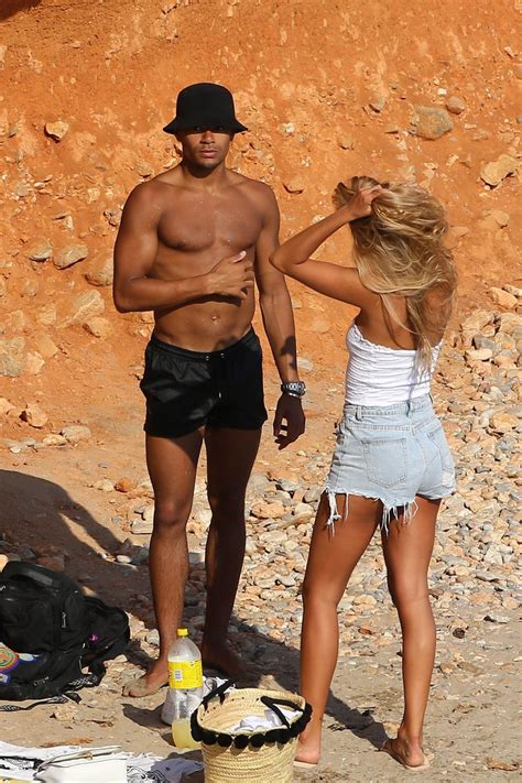 Arabella Chi and Wes Nelson - In a bikini spotted on a beach in Ibiza ...