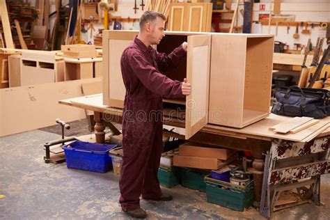 Carpenter Building Furniture in Workshop Stock Photo - Image of carpenter, joinery: 52860768