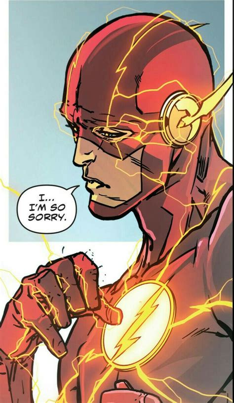 the flash is looking at something with his hand on his chest and it's glowing