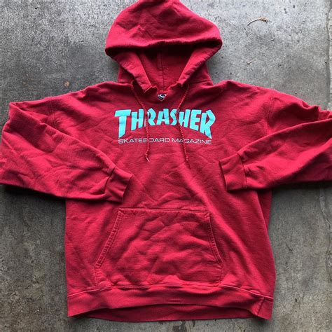 Thrashed hoodie. Red with teal font. Size L.... - Depop