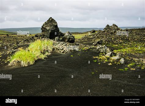 waterfall in green iceland landscape Stock Photo - Alamy