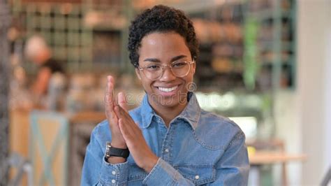 Portrait of Excited Young African Woman Clapping Stock Image - Image of ...