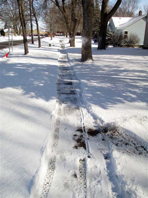 Taken For Granted: Snowy Sidewalk and Handy Snow Blower