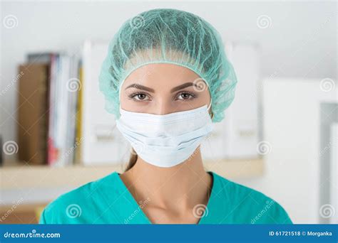 Portrait of Female Surgeon Wearing Protective Mask and Cup Stock Photo - Image of operating ...