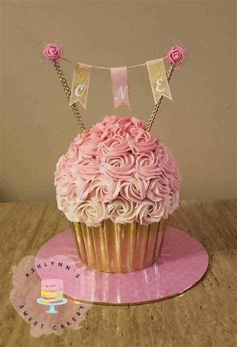 Pink and gold giant cupcake smash cake | Cupcake smash cakes, Pink smash cakes, Giant cupcakes