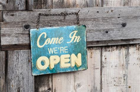 Vintage open sign on old wooden door — Stock Photo © pitamaha #38807703