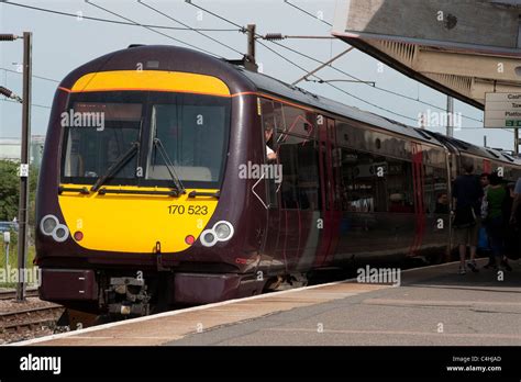 Class 170 turbostar train in Arriva Crosscountry trains livery at a railway station in England ...