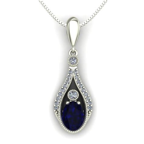 Blue sapphire and diamond drop pendant in 14k white gold | Charles Babb Designs