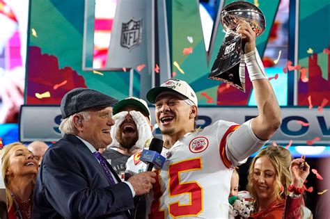 Patrick Mahomes kisses wife after Chiefs' Super Bowl 2023 win