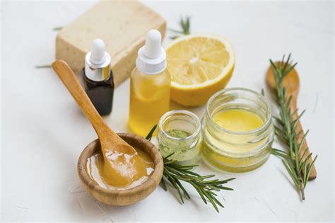 Natural skincare ingredients with manuka honey, lemon, essential oil ...