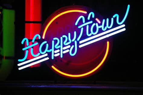 Royalty-Free photo: Blue, yellow, and white Happy Hour neon sign | PickPik