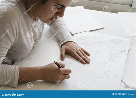 Young Female Architect Working on Sketches Stock Image - Image of document, draft: 90796583