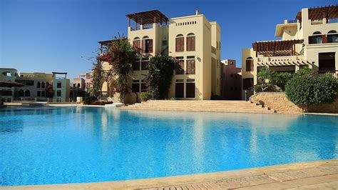 JORDAN, AQABA, DECEMBER 10, 2016: Outdoor swimming pool with clean water in hotel at Tala Bay ...