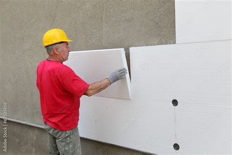 Styrofoam, polystyrene thermal insulation of house wall install Stock ...