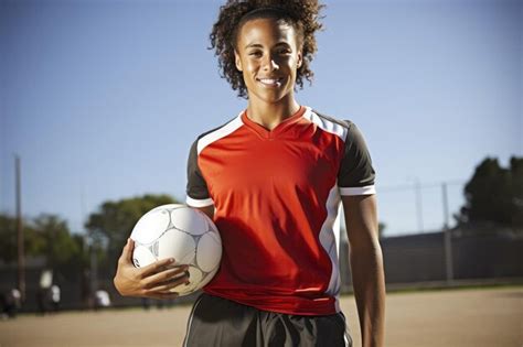 Premium AI Image | Black female soccer player with a soccer ball