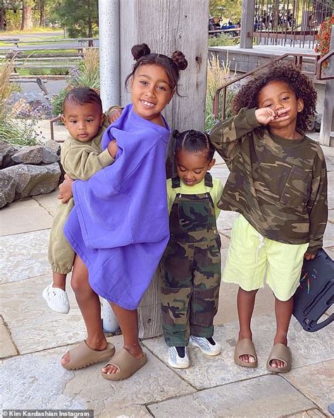 Kim Kardashian shares portraits of four children and husband Kanye West amid marriage struggles ...