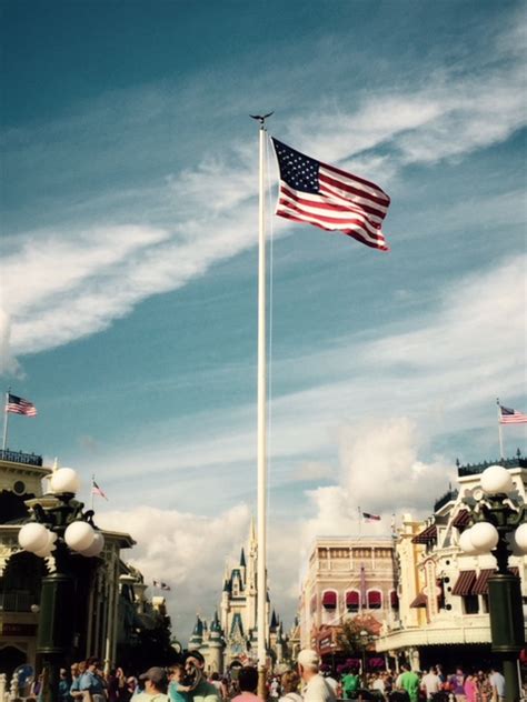 Disney World - Magic Kingdom's Flag Retreat - Living a Disney ...