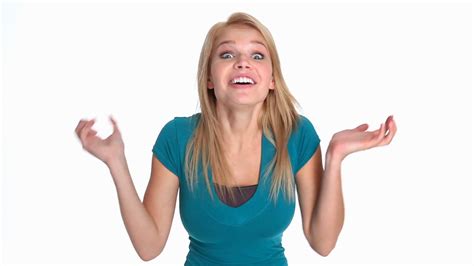 Excited young woman waving her hands and laughing enthusiastically Stock Video Footage - Storyblocks