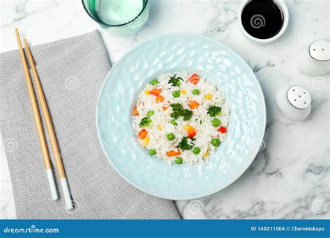 Boiled Rice With Vegetables Served On Marble Table Stock Photo - Image ...