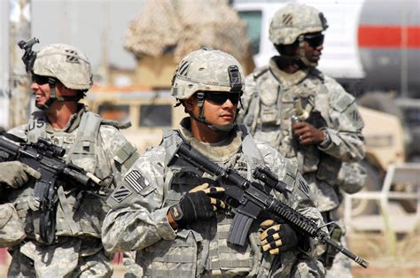 TUNIS, Iraq (October 16, 2007) - U.S. Army Soldiers patrol the streets . | Army pics, Army ...