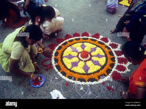 Athapoo; Pookalam, floral decoration during Onam festival, Kerala, India Stock Photo - Alamy