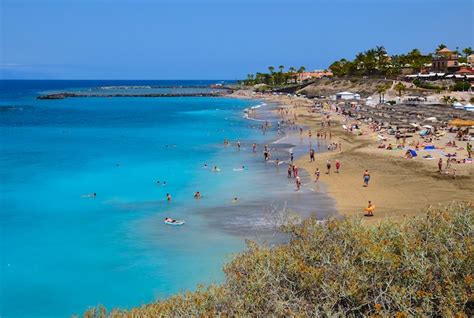 Premium Photo | View of el duque beach in costa adeje, tenerife, canary islands, spain.