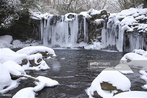 Falls In Winter High-Res Stock Photo - Getty Images