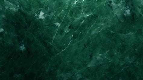 Premium Photo | A green marble texture with a dark green marble texture