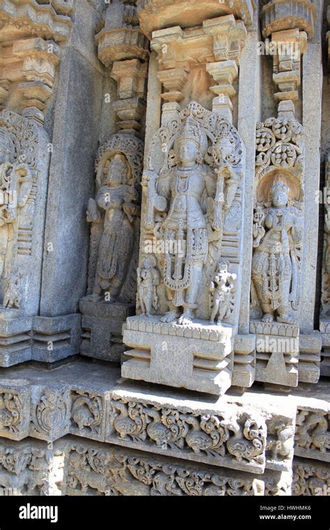 Detailed stone sculptures on the shrine wall of Chennakesava Temple ...