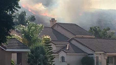 Brush fire threatening homes in Fontana neighborhood - ABC7 Los Angeles