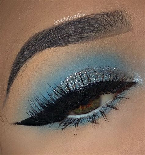 Icy baby blue silver glitter makeup look | Glitter makeup looks, Blue ...