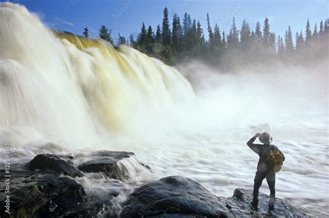 Hiker at Pisew Falls, Pisew Falls Provincial Park, Manitoba, Canada ...