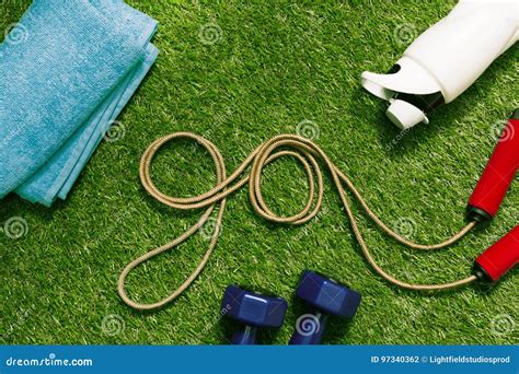 Jump Rope in Form of Word Go with Towel and Bottle Stock Photo - Image of outdoors, training ...