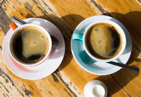 Flat Lay Photography of Two Cups of Coffee · Free Stock Photo