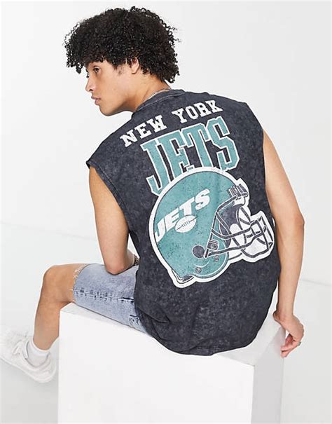 ASOS DESIGN vest with NFL New York Jets prints in washed black | ASOS