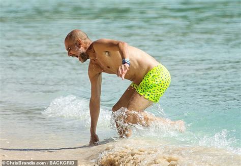 Manchester City boss Pep Guardiola enjoys holiday after winning fourth ...