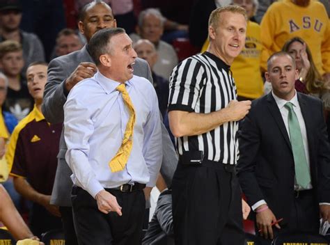 Arizona State University head coach Bobby Hurley gets hurled by referee